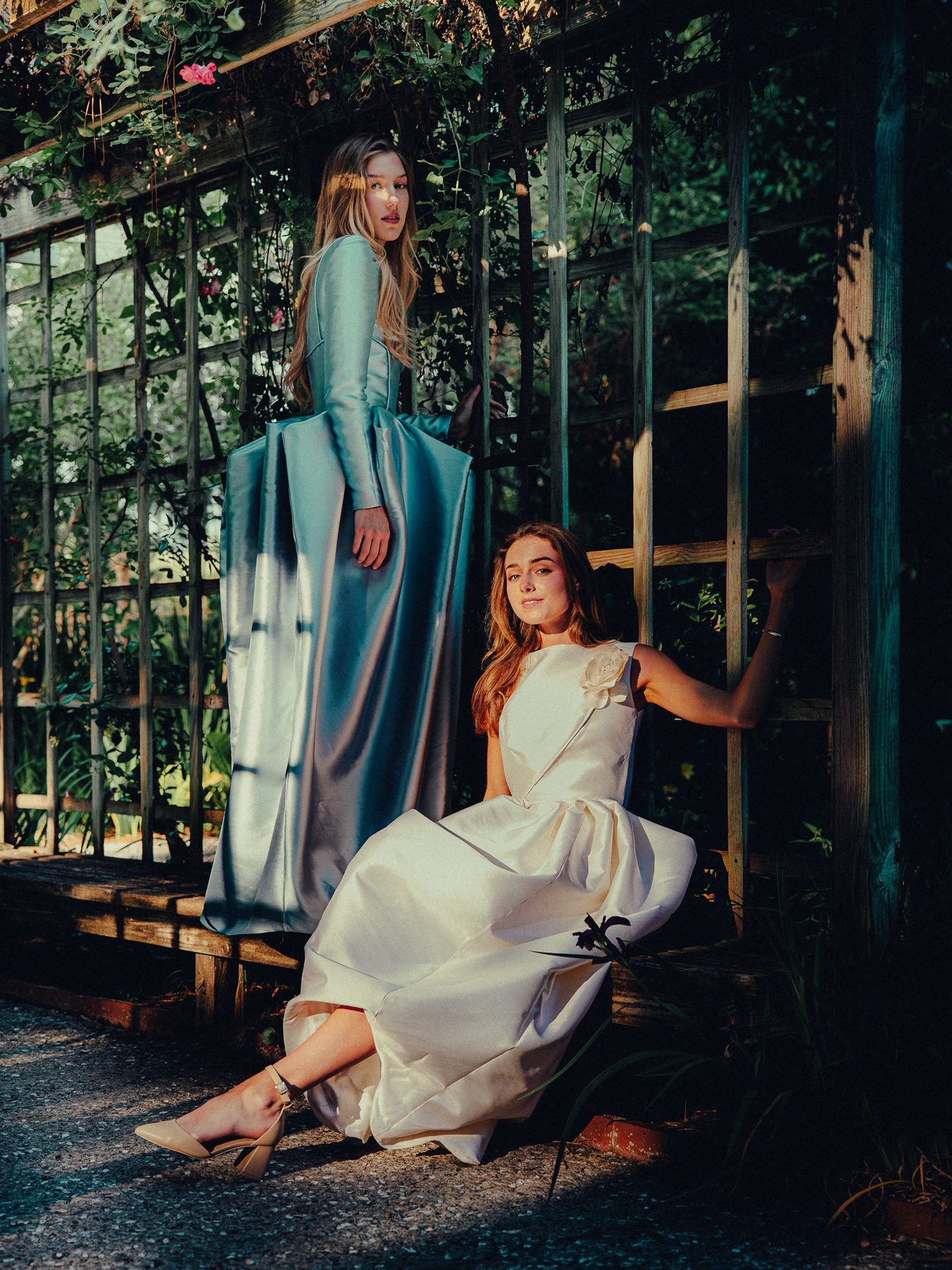 Two gowns on the trellis