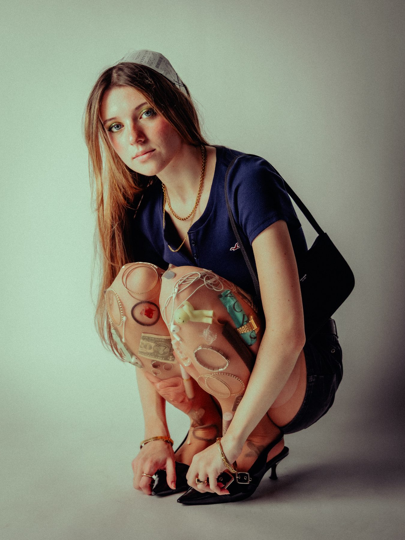 Crouched studio portrait